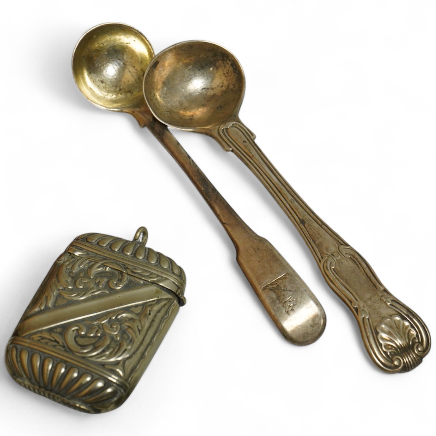A small collection of silver and white metal charms, including Holy Bible, Penny Farthing, hedgehog and squirrel, together with a silver compact and ashtray, a silver and paste brooch, nut vesta, pipe, etc.